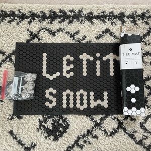 Black and white tile mat